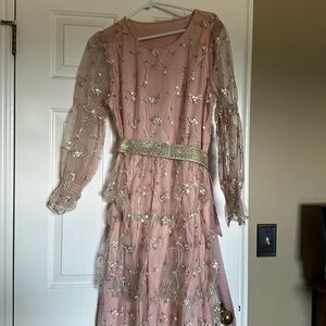 Brand new dress never been worn fits a little big